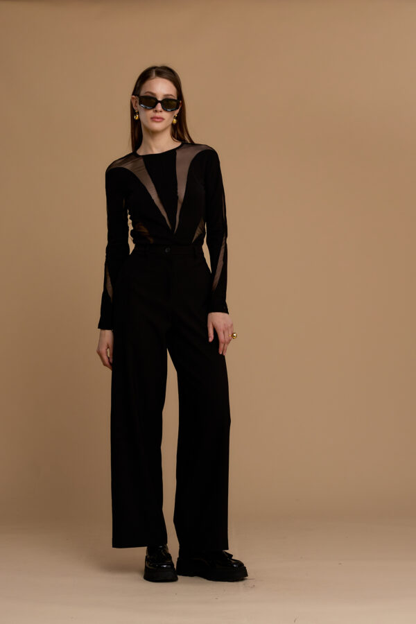 Risqué under-jacket knit top
