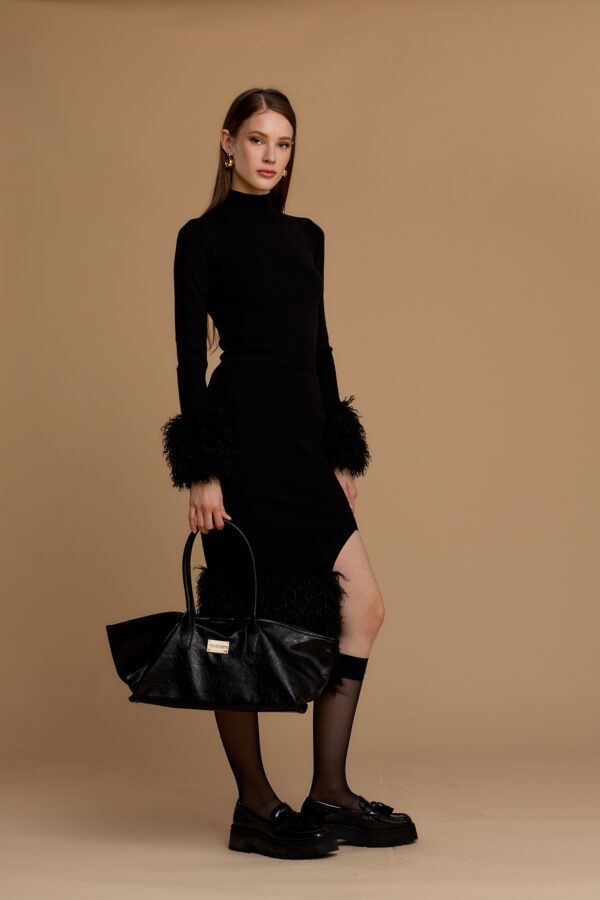 Turtleneck with faux Mongolian fur cuffs